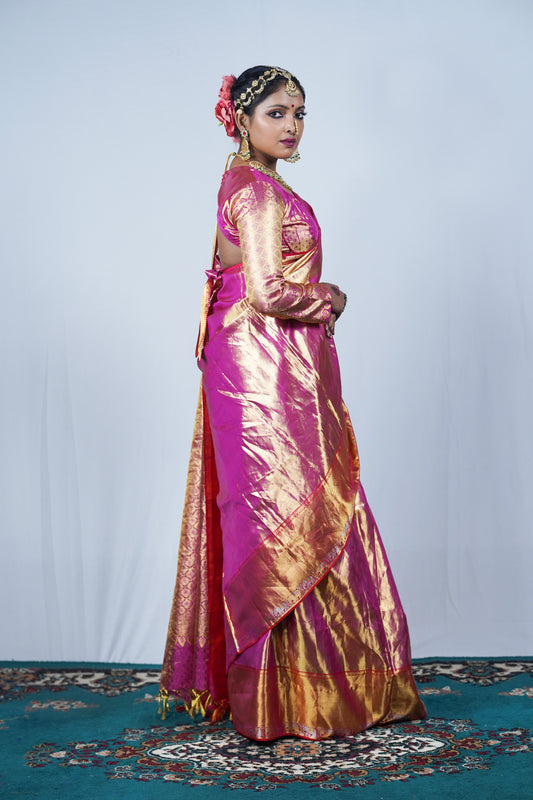 Hand woven Kanjiveeram silk pink and gold saree