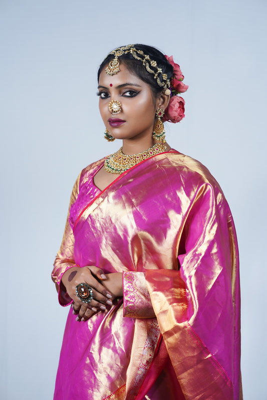Hand woven Kanjiveeram silk pink and gold saree