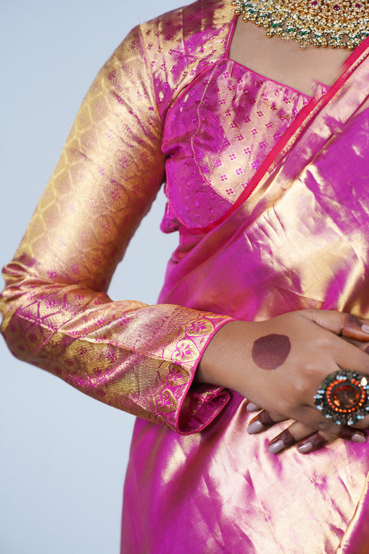 Hand woven Kanjiveeram silk pink and gold saree