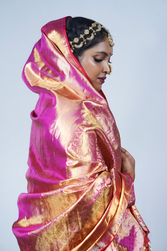 Hand woven Kanjiveeram silk pink and gold saree