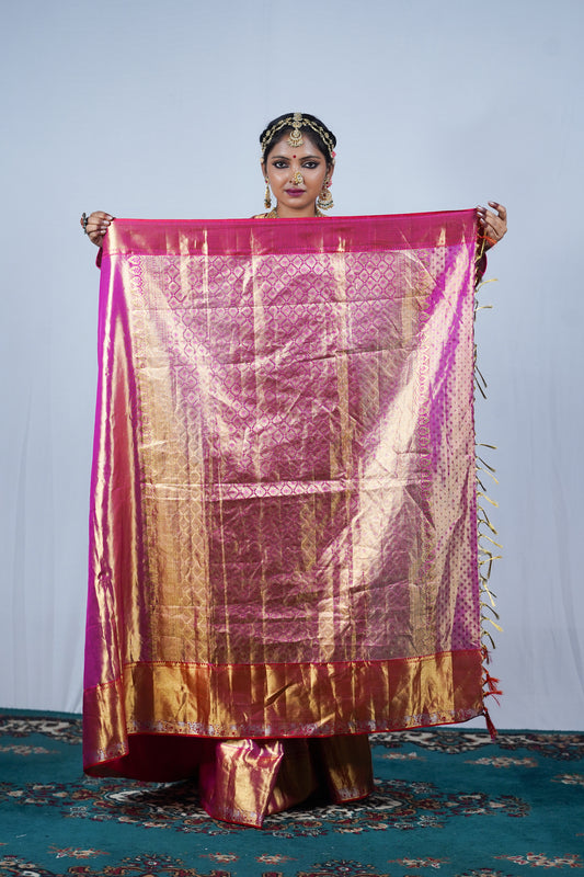 Hand woven Kanjiveeram silk pink and gold saree