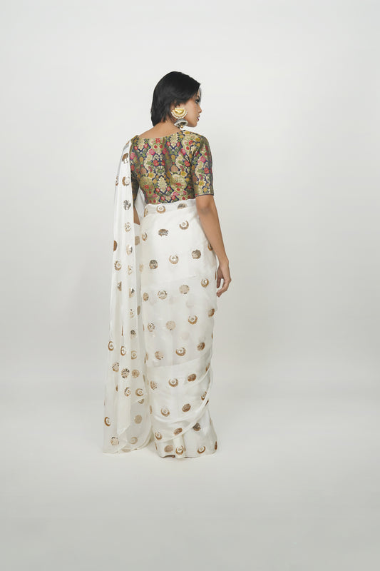 White and gold party wear saree by Ayush Kejriwal