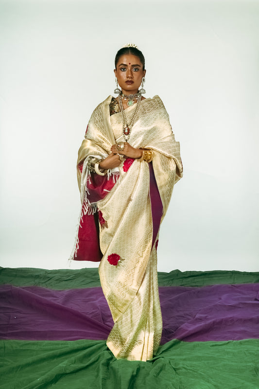 A woman dressed in a hand woven benarsi silk saree designed by Ayush Kejriwal.