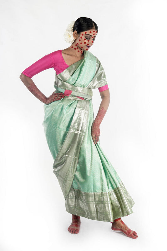 Hand woven Kanjiveram mint green silk saree