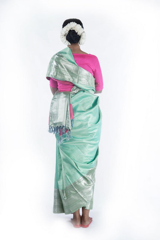 Hand woven Kanjiveram mint green silk saree
