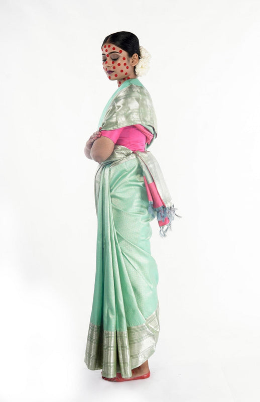 Hand woven Kanjiveram mint green silk saree