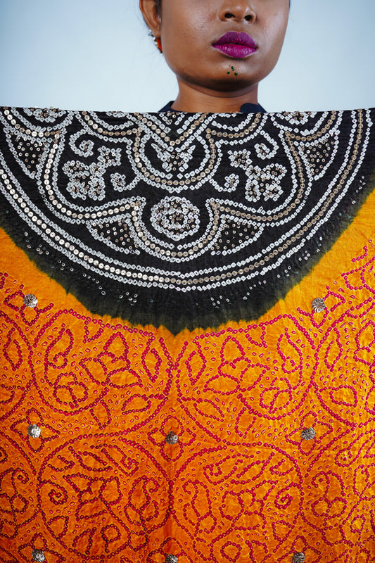 Hand embroidery details of an Indian wedding bandhani dupatta designed by Ayush Kejriwal.