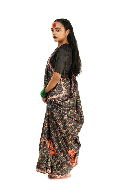 printed silk saree with a scalloped handembroidered border