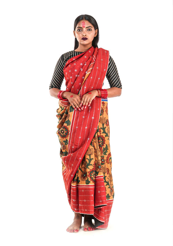 Hand painted pen Kalamkari saree on a handwoven kanjiveram silk base