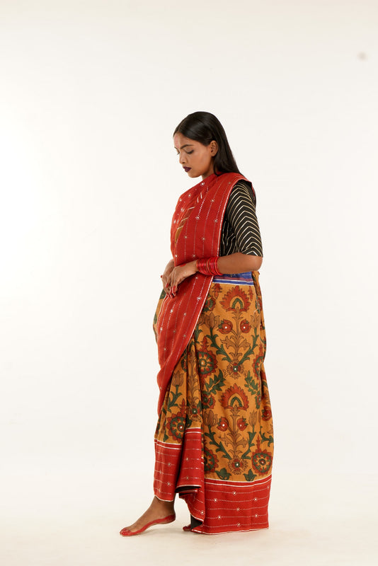 Hand painted pen Kalamkari saree on a handwoven kanjiveram silk base