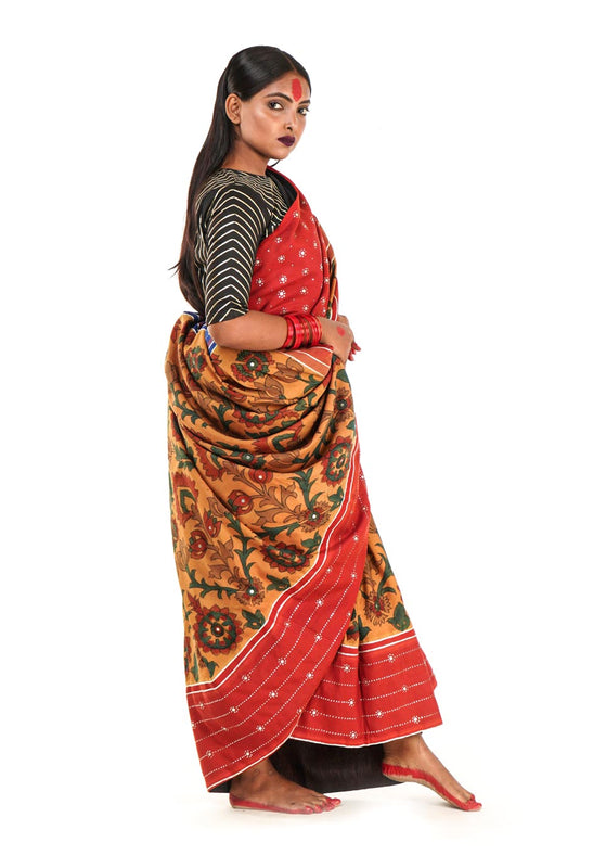 Hand painted pen Kalamkari saree on a handwoven kanjiveram silk base