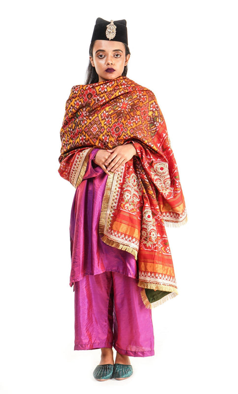 A women wearing a hand woven patola silk dupatta designed by Ayush Kejriwal.