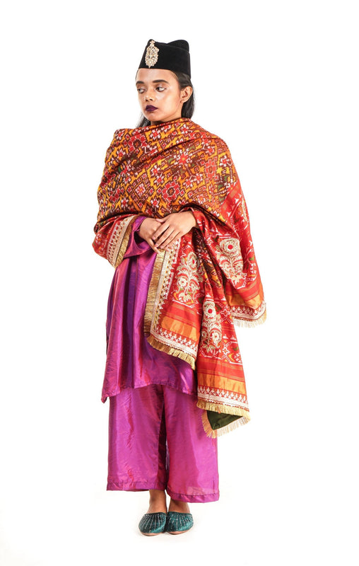 A women wearing a hand woven patola silk dupatta designed by Ayush Kejriwal.
