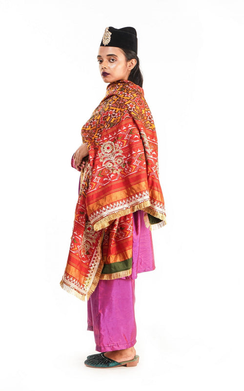 A women wearing a hand woven patola silk dupatta designed by Ayush Kejriwal.