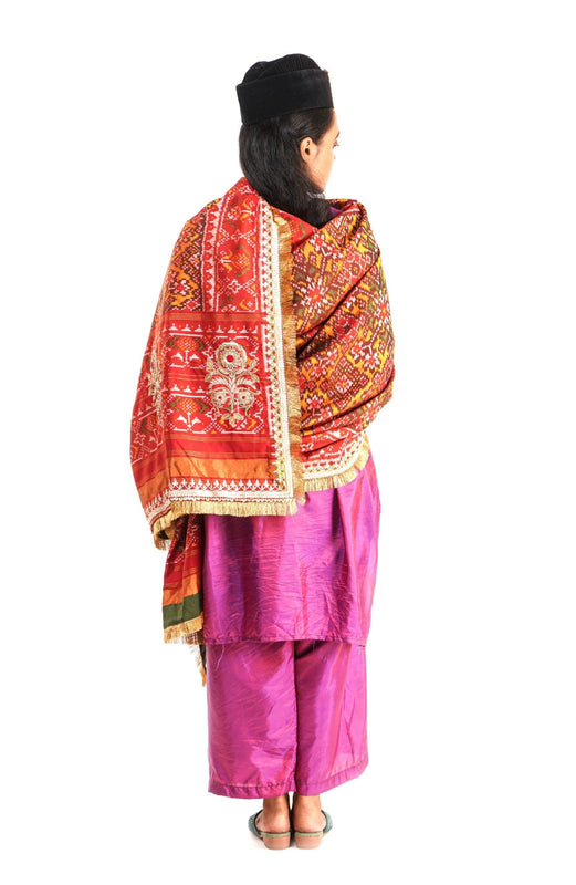 A women wearing a hand woven patola silk dupatta designed by Ayush Kejriwal.