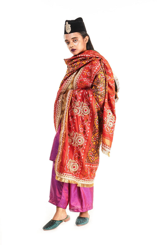 A women wearing a hand woven patola silk dupatta designed by Ayush Kejriwal.