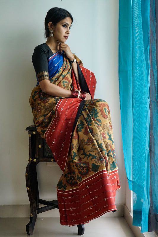 Hand painted pen Kalamkari saree on a handwoven kanjiveram silk base