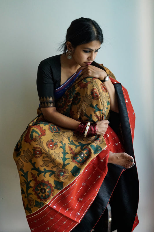 Hand painted pen Kalamkari saree on a handwoven kanjiveram silk base