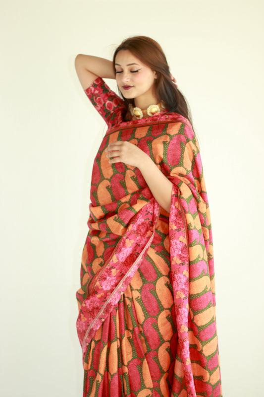 A woman wearing a printed silk saree designed by Ayush Kejriwal.