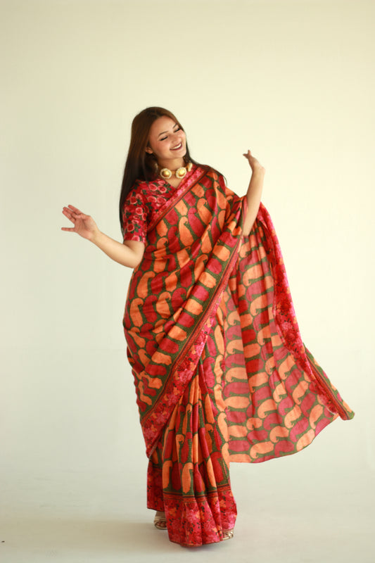 A woman wearing a printed silk saree designed by Ayush Kejriwal.