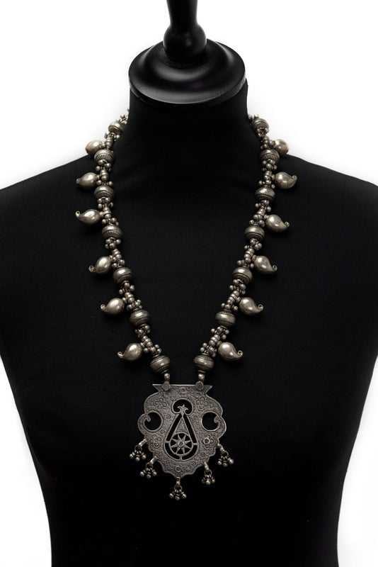 Statement vintage silver neckpiece.