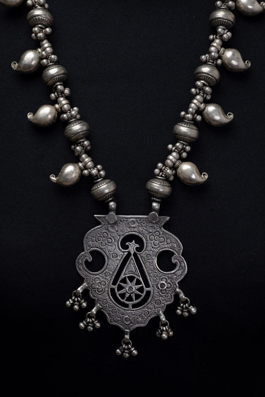 Statement vintage silver neckpiece.