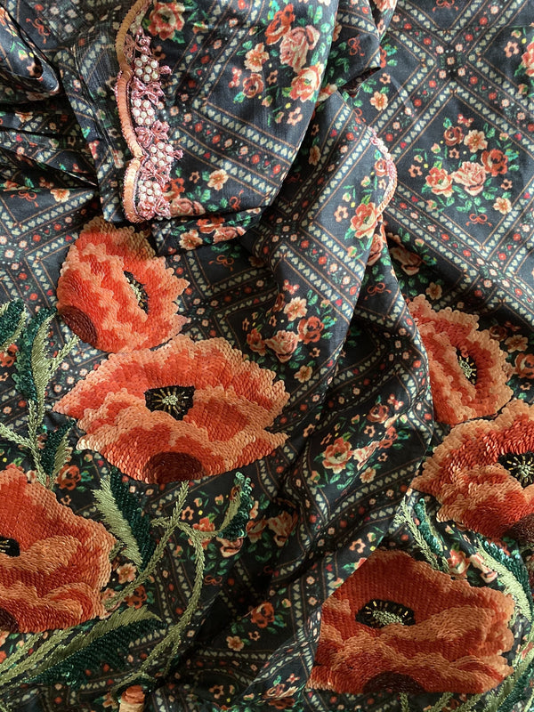 printed silk saree with a scalloped handembroidered border