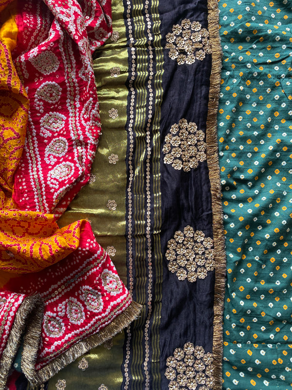 Embroidery details of an Indian wedding bandhani dupatta designed by Ayush Kejriwal.