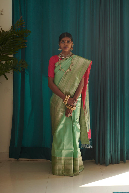 Hand woven Kanjiveram mint green silk saree