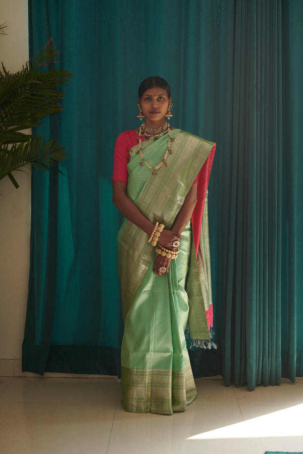 Hand woven Kanjiveram mint green silk saree