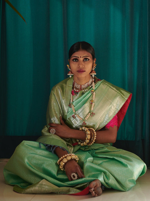 Hand woven Kanjiveram mint green silk saree