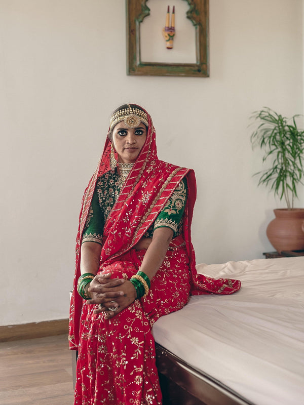 Red bridal wedding saree by Ayush Kejriwal