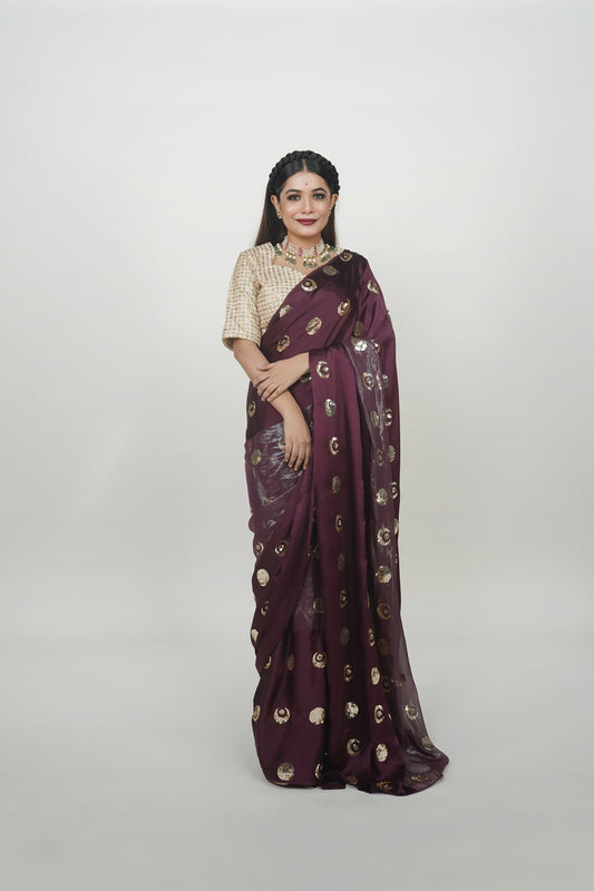 Designer wine and gold coloured silk partywear saree