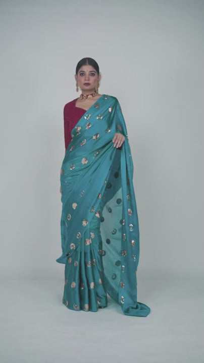 Teal and gold embroidered saree