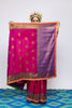 A woman wearing a beautiful handwoven benarsi silk saree designed by designer Ayush Kejriwal.