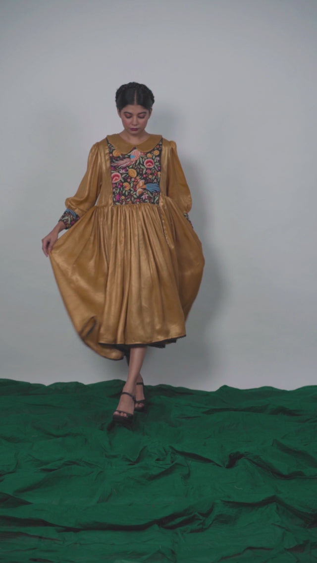 Golden  one size frock by Ayush Kejriwal