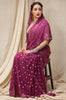 A woman wearing a hand embroidered georgette part wear saree designed by Ayush Kejriwal.