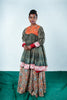 A woman wearing a Kurta and Plazo set designed by Designer Ayush Kejriwal.