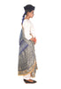A women wearing a hand woven wedding bandhani dupatta designed by Ayush Kejriwal.