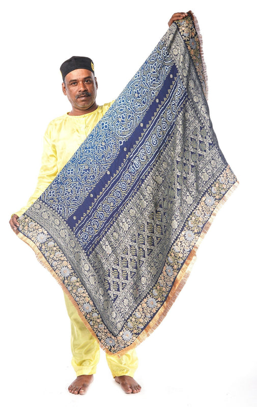 A  hand woven wedding bandhani dupatta designed by Ayush Kejriwal.