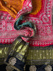 Hand embroidery details of an Indian wedding bandhani dupatta designed by Ayush Kejriwal.